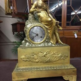 antique figural clock