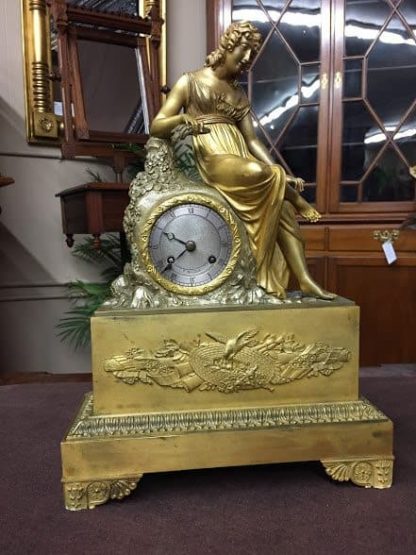 antique figural clock