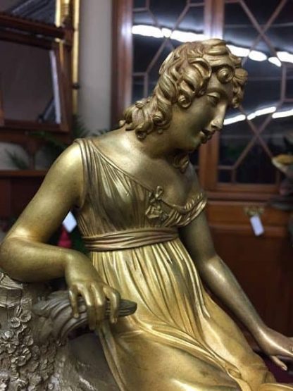 antique figural clock