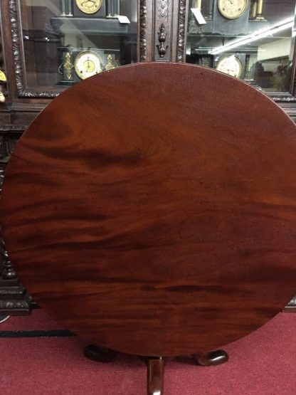 antique tilt top table