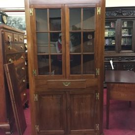 suter's walnut corner cabinet