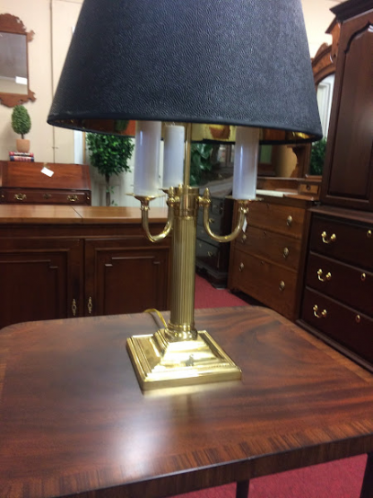 Brass Federal Style Lamp with Three bulbs. This beautiful brass lamp has a turn button the base.